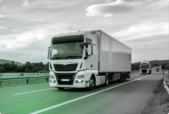 Two trucks on a highway