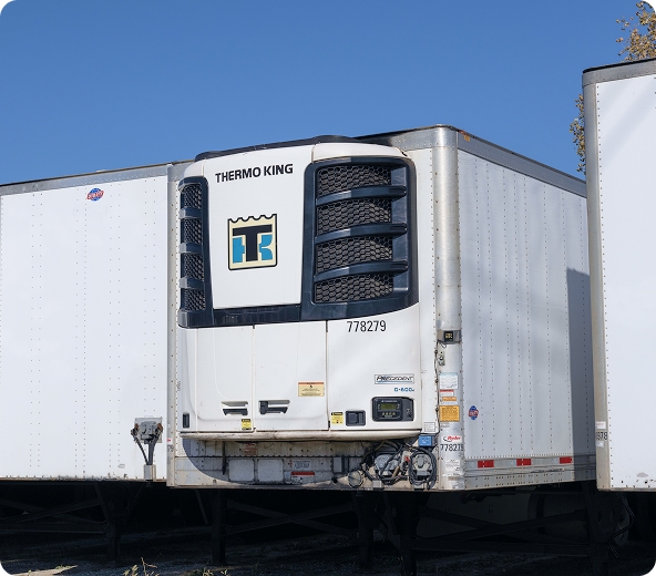 Refrigerated trailer in parking lot