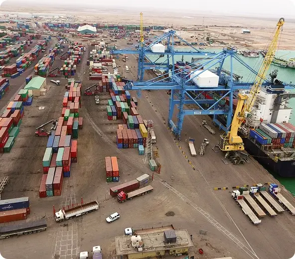 Container port with cranes and trucks